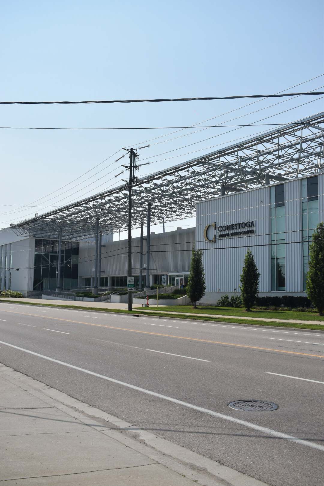 Photograph taken on a sunny day of the front Conestoga College's Waterloo Campus.