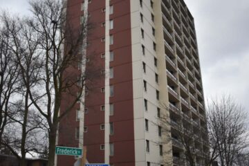 Photo of a high rise apartment building at the corner of Fredrick St. and Gordon Ave. in Kitchener.