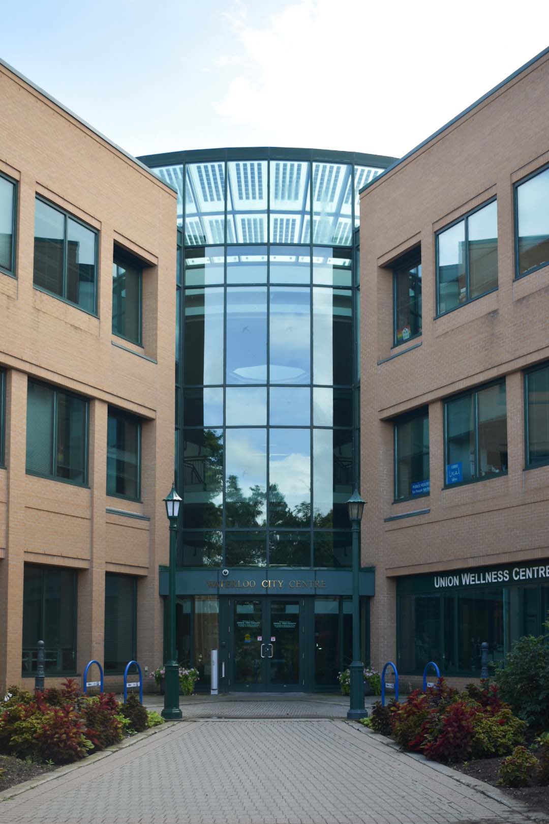 Photo of the front doors of the Waterloo City Centre building.