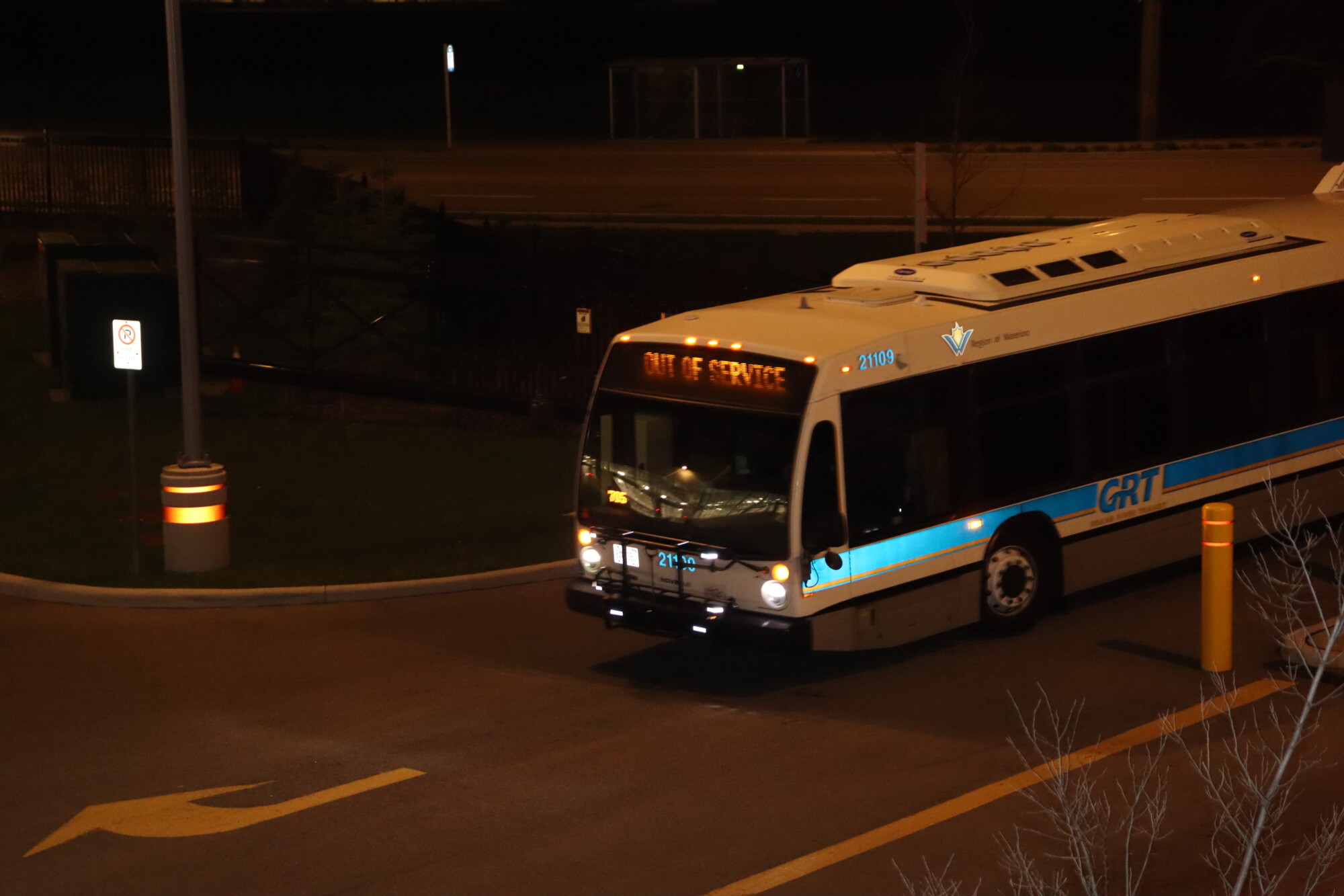 Photo of an out-of-service bus in the evening entering the GRT depot in Kitchener.