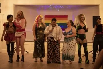 Photo of drag performers Melona, Sasha Tease, Lady Like, Manny Manilla, Eros Asteria, Axelle Wolfe and Dallas Ryder at the end of their show at The Walper Hotel.